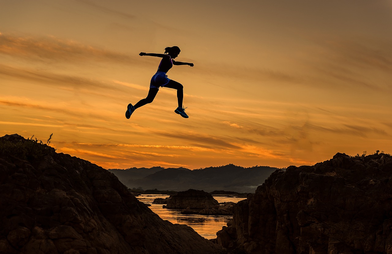 Visualization Techniques silhoutte of a woman-jumping-over-hills-at-sunset