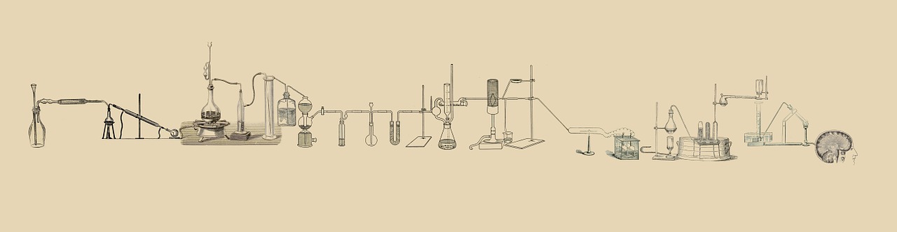 Psychic Abilities, antique line drawing of various scientific flasks all lined up against a human head 