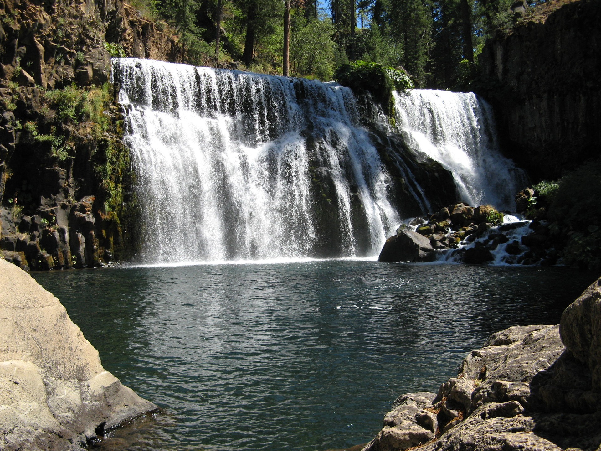 Nature sounds for sleep -a waterfall in a forest falling into a rock studded lagoon