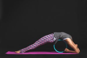 manifesting abundance flexible woman doing yoga